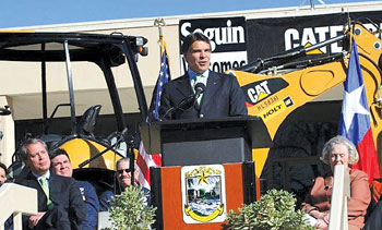 Texas Gov. Rick Perry welcomes Caterpillar's project in Seguin, Texas, which will create more than 1,400 jobs. The company is also pursuing a $140-million, 600-job project in North Little Rock, Ark.