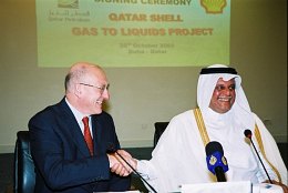Sir Philip Watts (left) with Abdullah Hamad Al-Attiyah